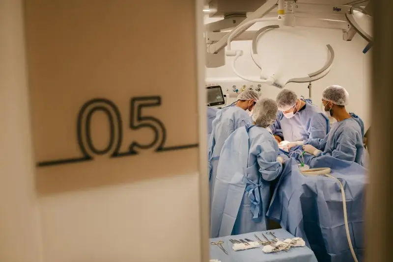 Surgeons in sterile gowns during an operation